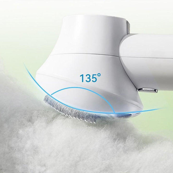 Handheld dog hair dryer with integrated grooming brush, perfect for quick-dry and detangling.