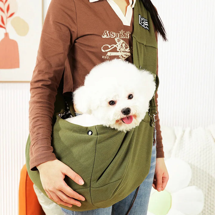 Pet Carrier Sling for small dogs & cats. Hands-free dog sling with adjustable strap for comfortable pet travel.