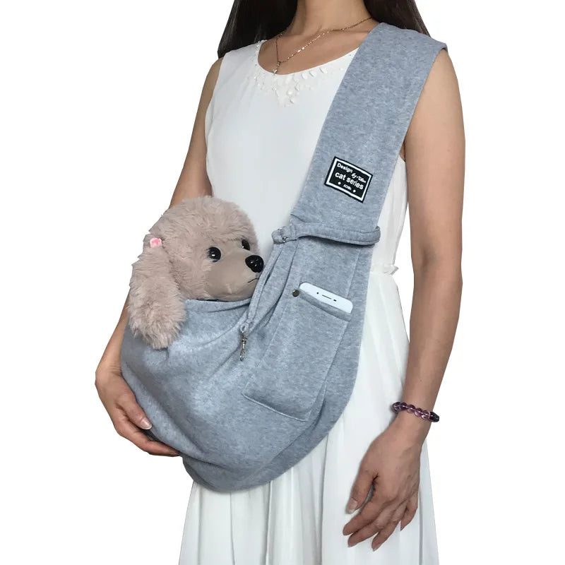 Adjustable dog & cat carrier sling for small pets. Perfect for hands-free walks & comfortable pet adventures.