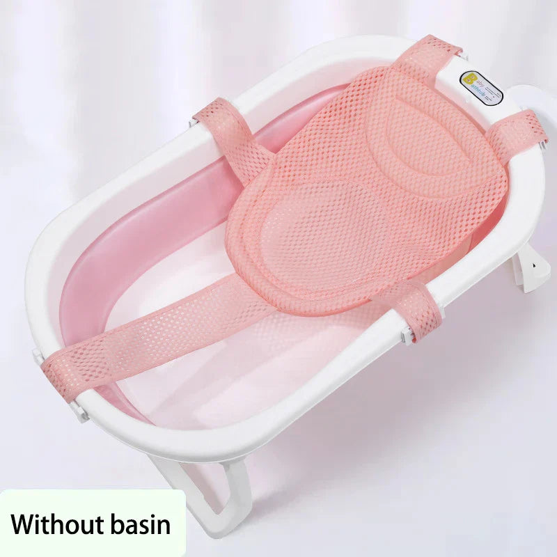Close-up of a non-slip infant bath support net, highlighting its soft, adjustable mesh fabric