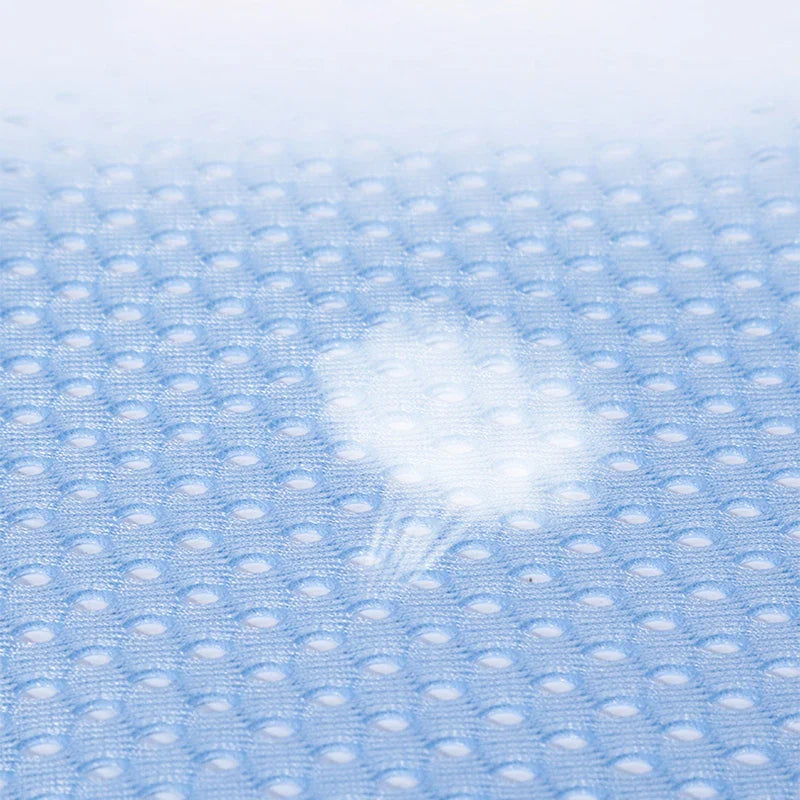 Overhead view of a blue adjustable baby bath net, showing its ergonomic design for newborns
