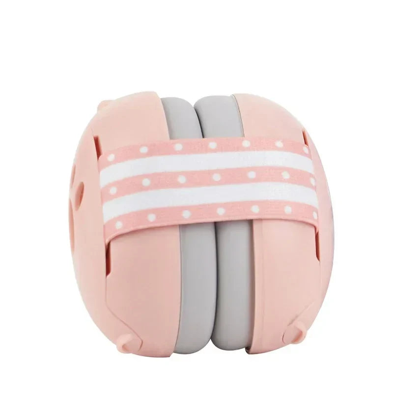 Baby noise-canceling earmuffs in an airplane, ensuring a peaceful sleep for infants and toddlers during travel.