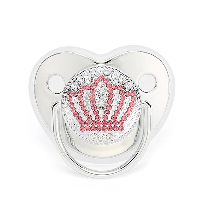 Collection of various colored BPA-free silicone pacifiers for baby care