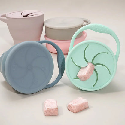 Pink collapsible silicone snack cup for kids, BPA-free, portable baby feeding container