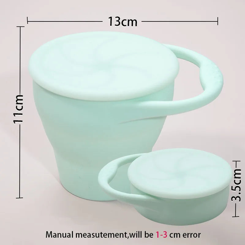 Orange kids travel snack cup, collapsible silicone design, safe for baby feeding