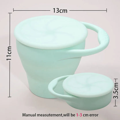Orange kids travel snack cup, collapsible silicone design, safe for baby feeding