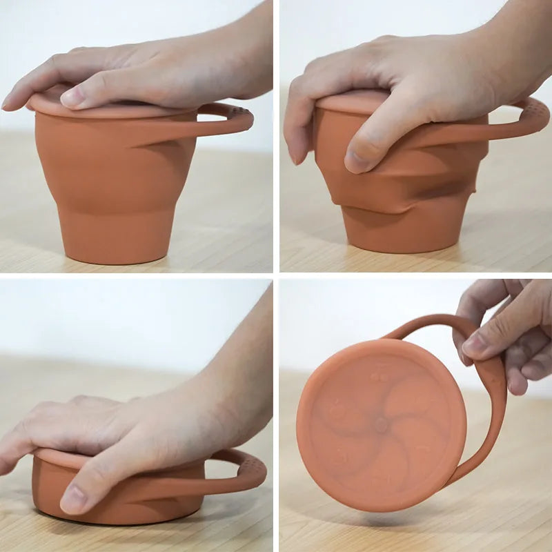 Close-up of a purple collapsible silicone snack cup, bpa-free, for toddler snacks