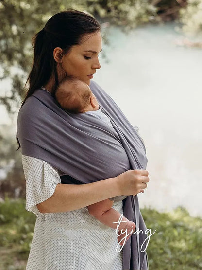 Ergonomic infant wrap, unisex design for secure baby carrying, made from soft cotton for ultimate comfort.