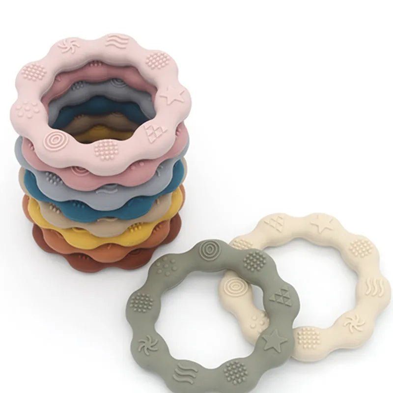 Pink flower silicone baby teether, BPA-free, for infant teething relief and oral development