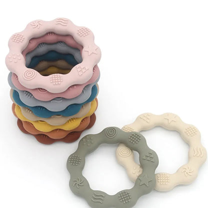 Pink flower silicone baby teether, BPA-free, for infant teething relief and oral development