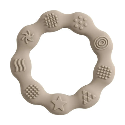 White silicone baby teether, soft and BPA-free, essential for newborn oral development