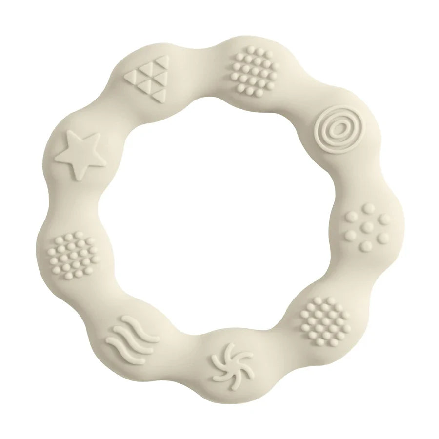 Ergonomic BPA-free silicone teether, easy for baby to grip, provides teething relief