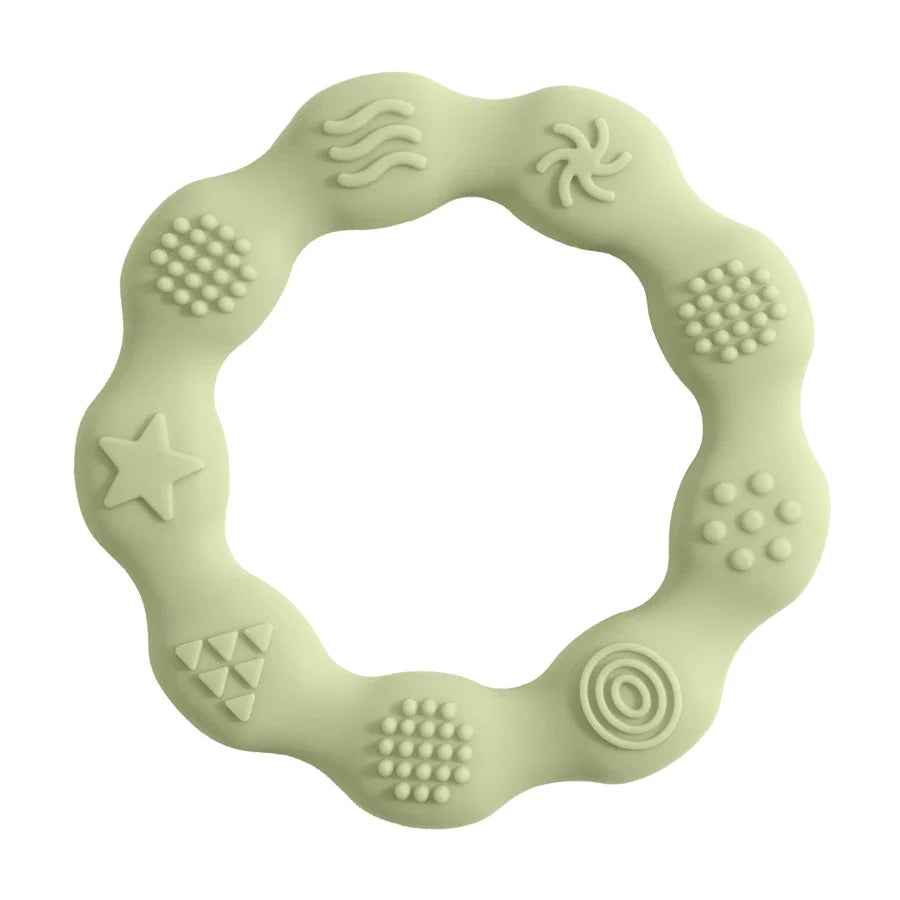 Pink silicone flower teether on a clean surface, a BPA-free molar toy for baby health