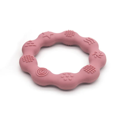 Set of two BPA-free silicone teethers: pink flower and green ring, for newborn essentials and relief