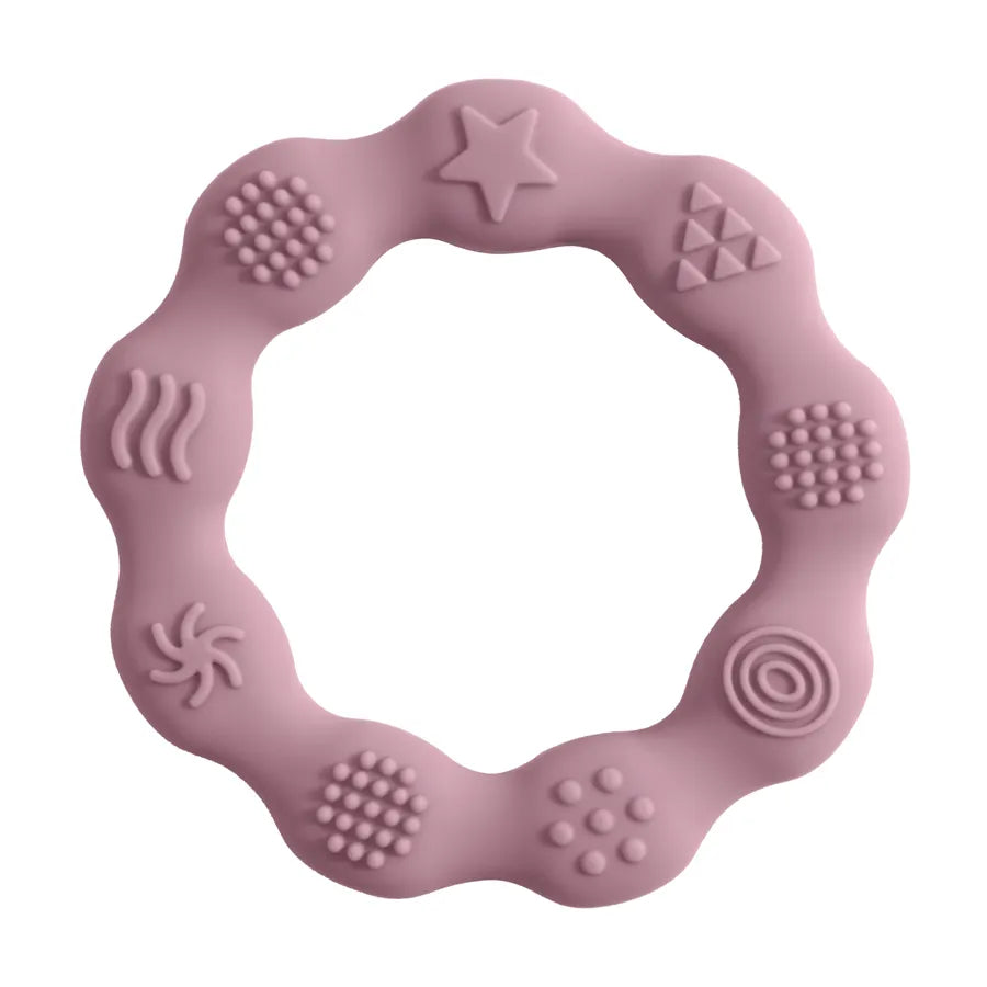 Textured silicone baby teether in purple, BPA-free, promoting healthy infant oral development