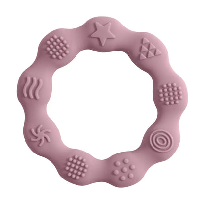 Textured silicone baby teether in purple, BPA-free, promoting healthy infant oral development