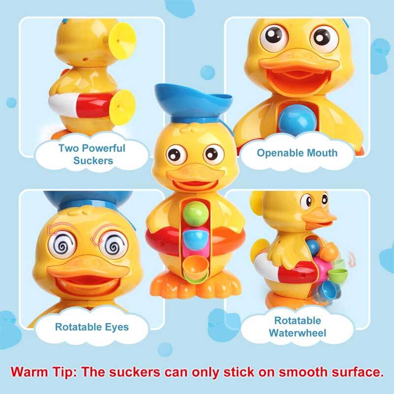 Two interactive duck bath toys, pink and green, floating together in a tub