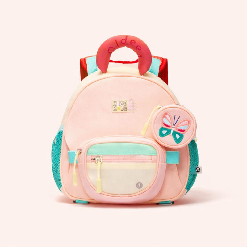 Detail of comfortable, adjustable shoulder straps on a pink kids' lightweight school backpack.