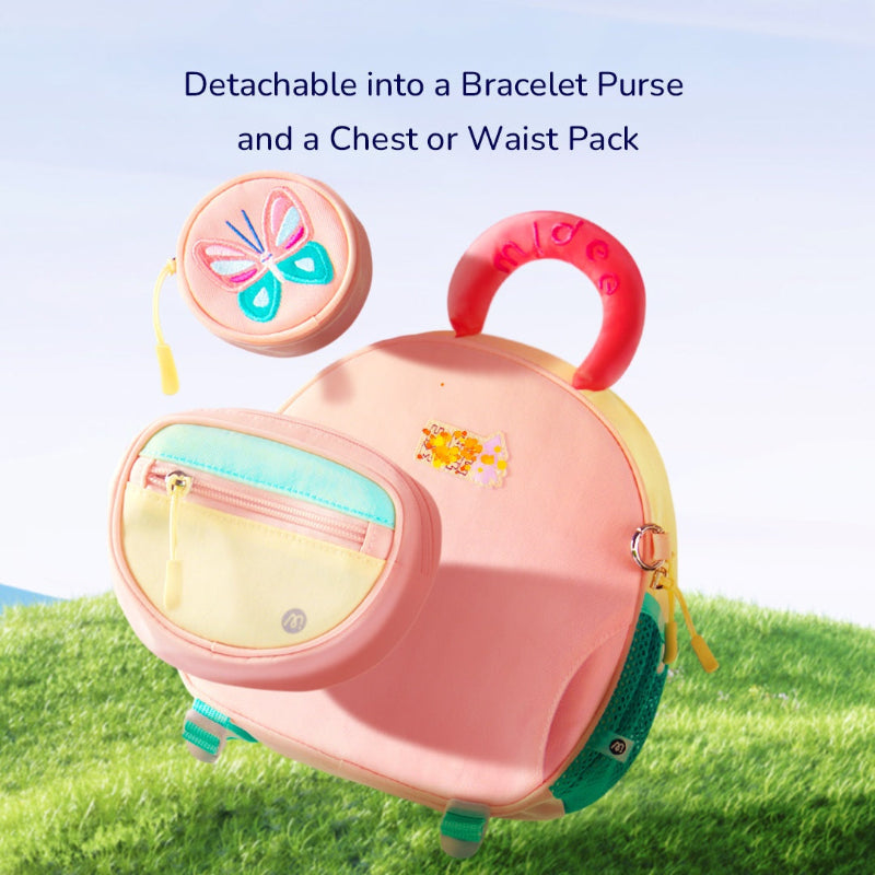 Close-up of the water bottle holder on a green kids' school backpack, demonstrating good organization.