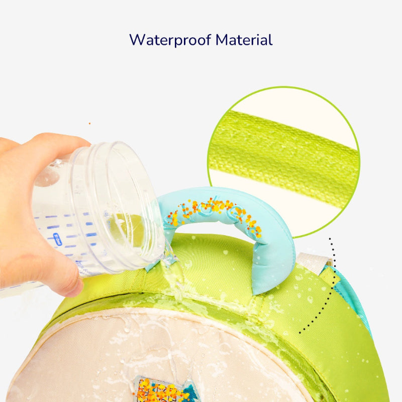 Side view of a green kids' school bag with water bottle holder, emphasizing its compact yet spacious design.