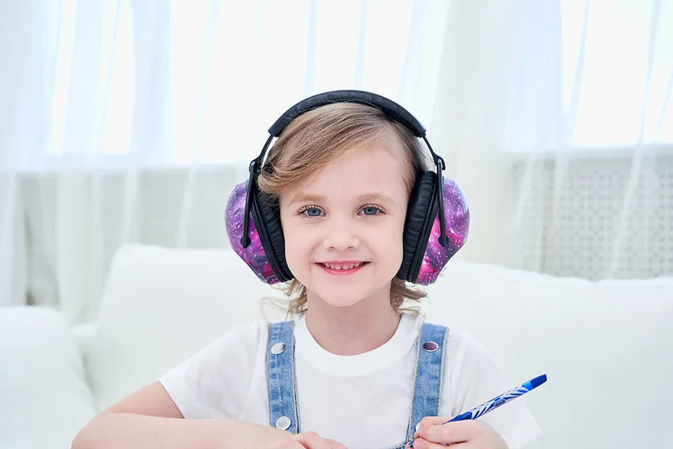 Pink kids noise reduction ear muffs for sound protection & baby safety, perfect for concerts or study.