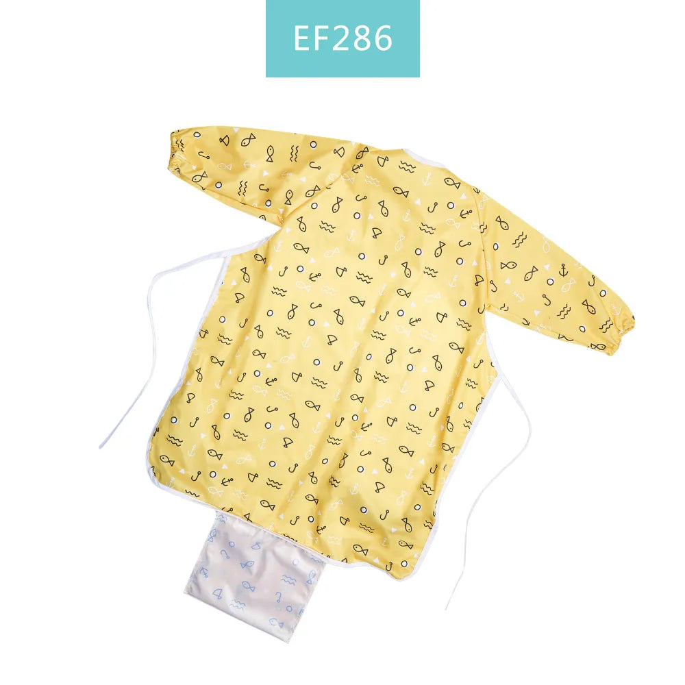 Close-up of waterproof fabric and sturdy pocket on a long sleeve baby feeding bib