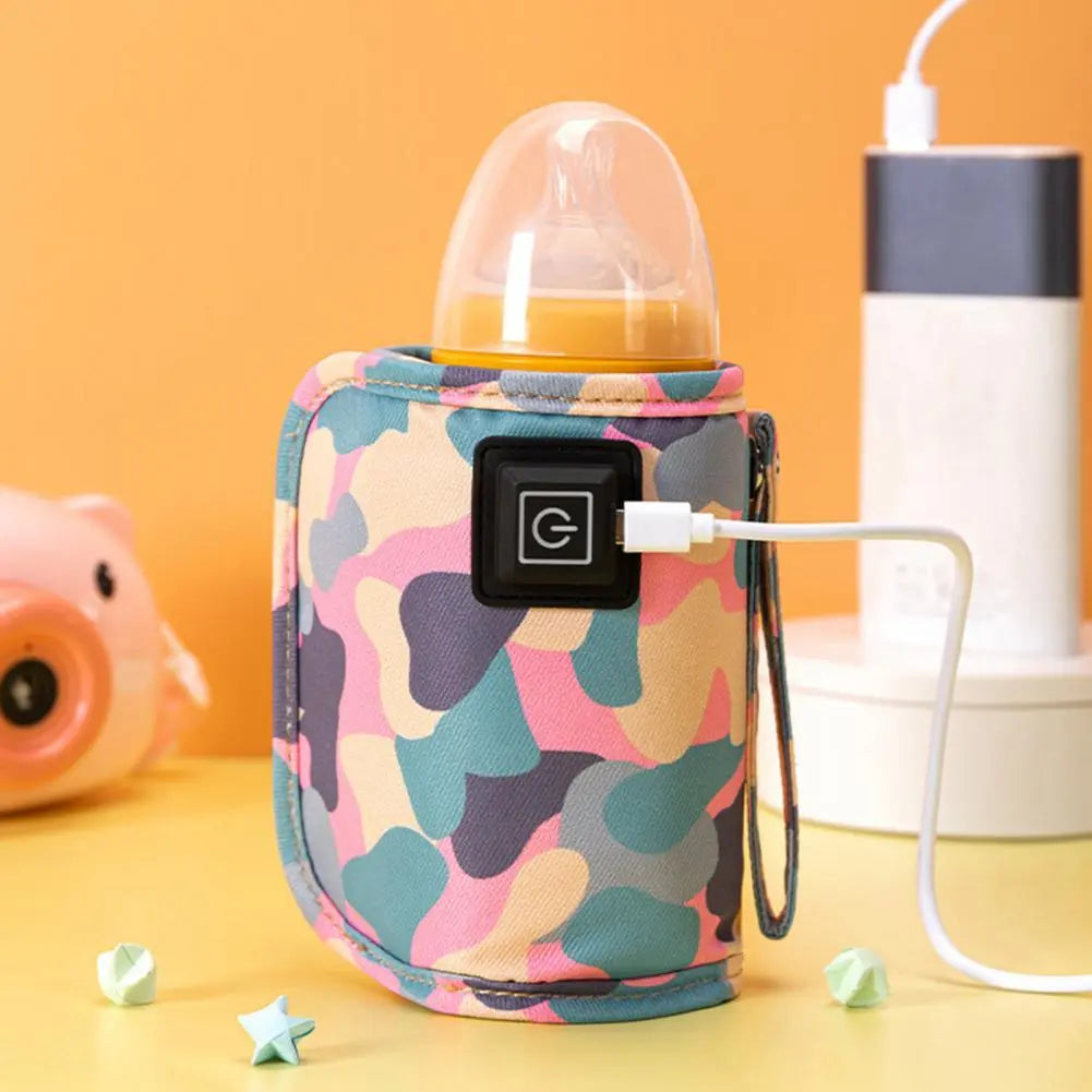 Pink portable USB baby bottle warmer bag, insulated for on-the-go infant feeding & travel.