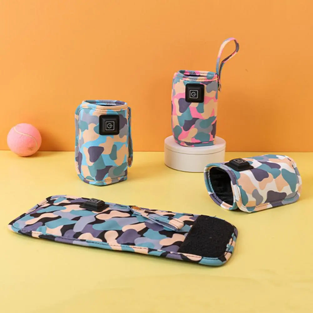 Insulated black baby bottle warmer bag with USB for portable infant feeding & travel gear.