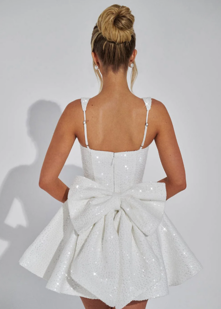 Glamorous women's pink sequin bow dress, skater style for homecoming & formal dance.