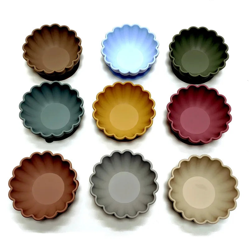 Green silicone suction plate for toddlers, durable and BPA-free dinnerware