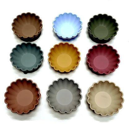 Green silicone suction plate for toddlers, durable and BPA-free dinnerware