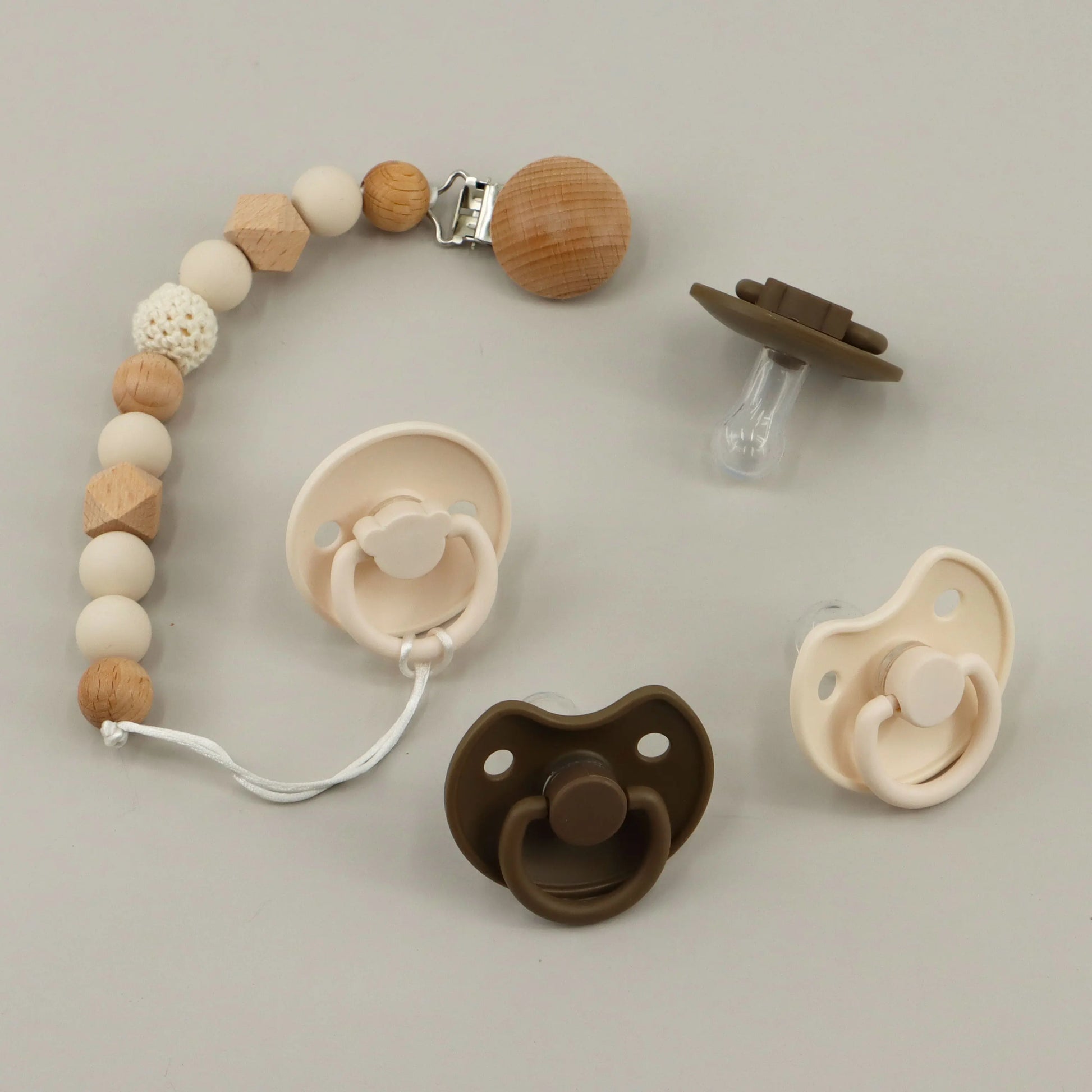 Silicone baby soother with loop handle, newborn pacifier for easy grip, infant comfort