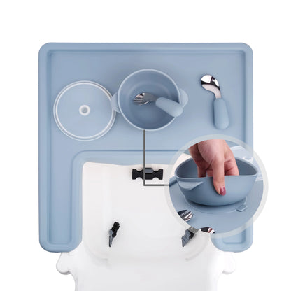 Gray food-grade silicone placemat, ideal for baby feeding on a high chair. Non-slip & easy to clean.