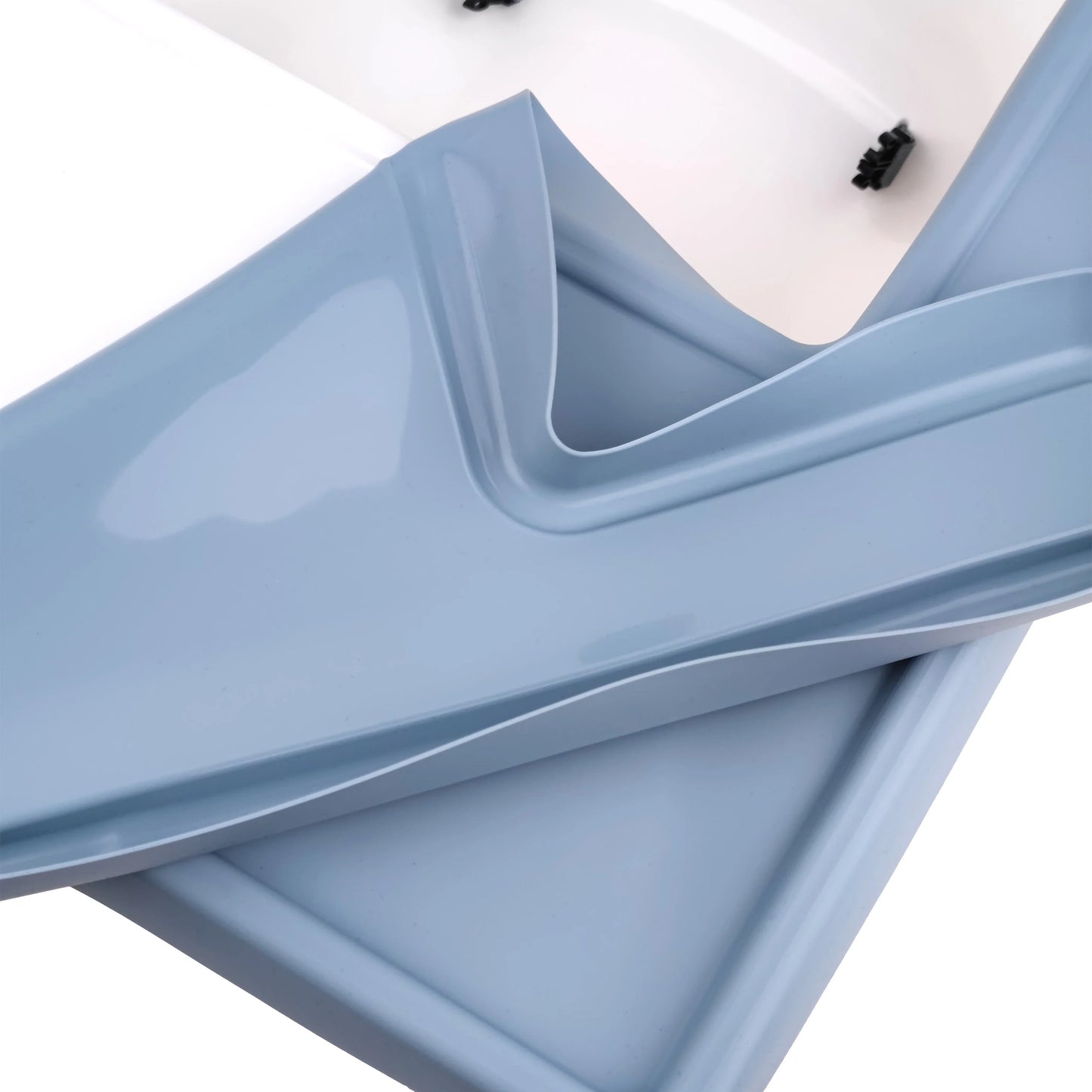 Close-up of a blue silicone high chair placemat textured surface. Easy-clean baby feeding essential.