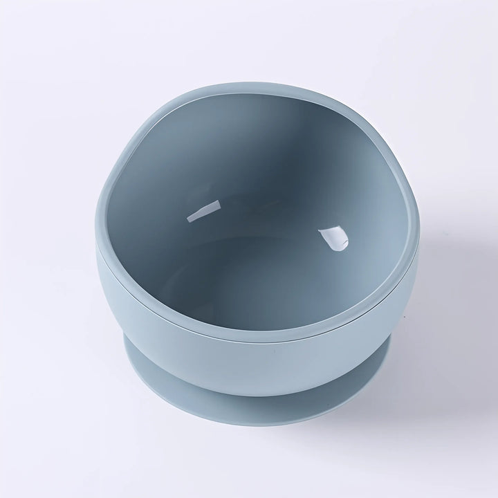 Baby-friendly silicone suction bowl, BPA-free and easy to clean after messy meals.