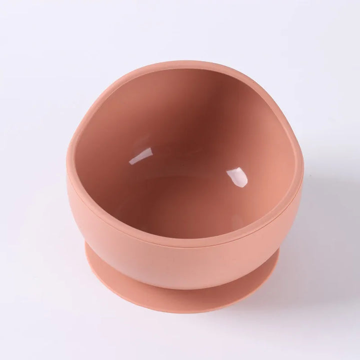 Colorful set of silicone suction bowls, ideal baby dinnerware for mess-free weaning.