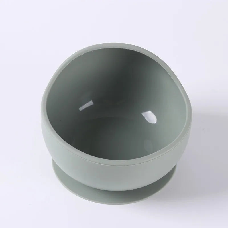 Front view of a purple silicone suction bowl, designed for mess-free baby feeding.
