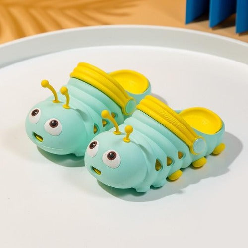 Green waterproof clogs for toddlers featuring a fun caterpillar design, perfect non-slip shoes for summer outdoor play