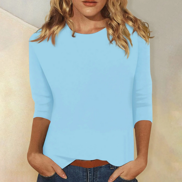 Blue women's 3/4 sleeve round neck top, a comfortable & versatile casual top for everyday wear & style.