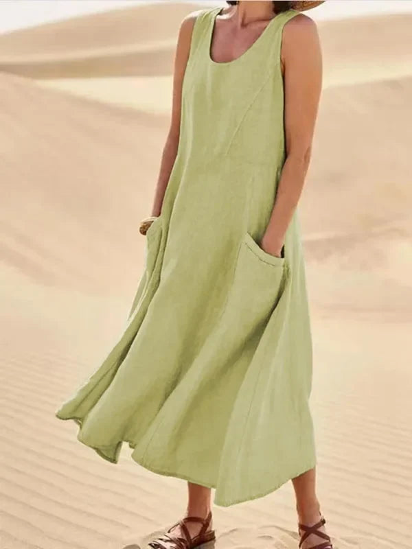 Flowy pink women's dress, comfortable for summer days & casual outings.