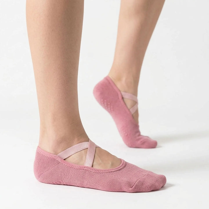 Women's non-slip grip socks in pink for yoga, pilates, dance & studio fitness. Low-cut athletic activewear.