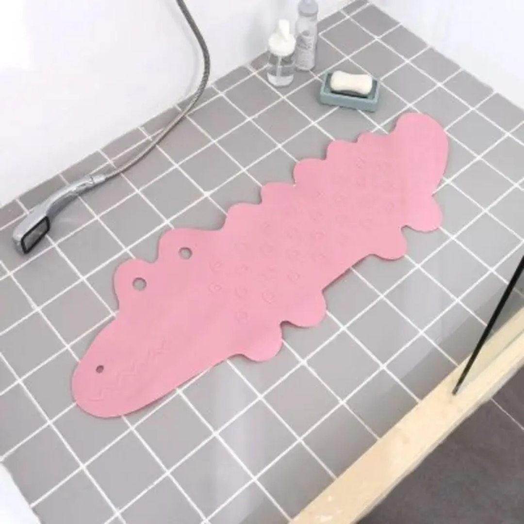 Playful green crocodile kids' non-slip bath mat, ensuring safety in bathroom for children.