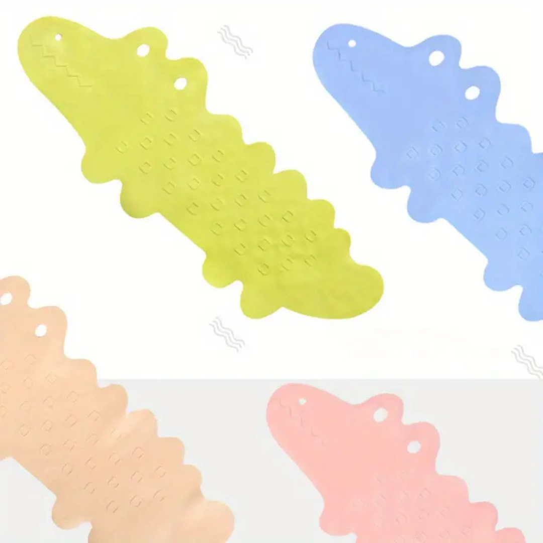 Child stepping on a non-slip crocodile bath mat, emphasizing bathroom safety for kids.