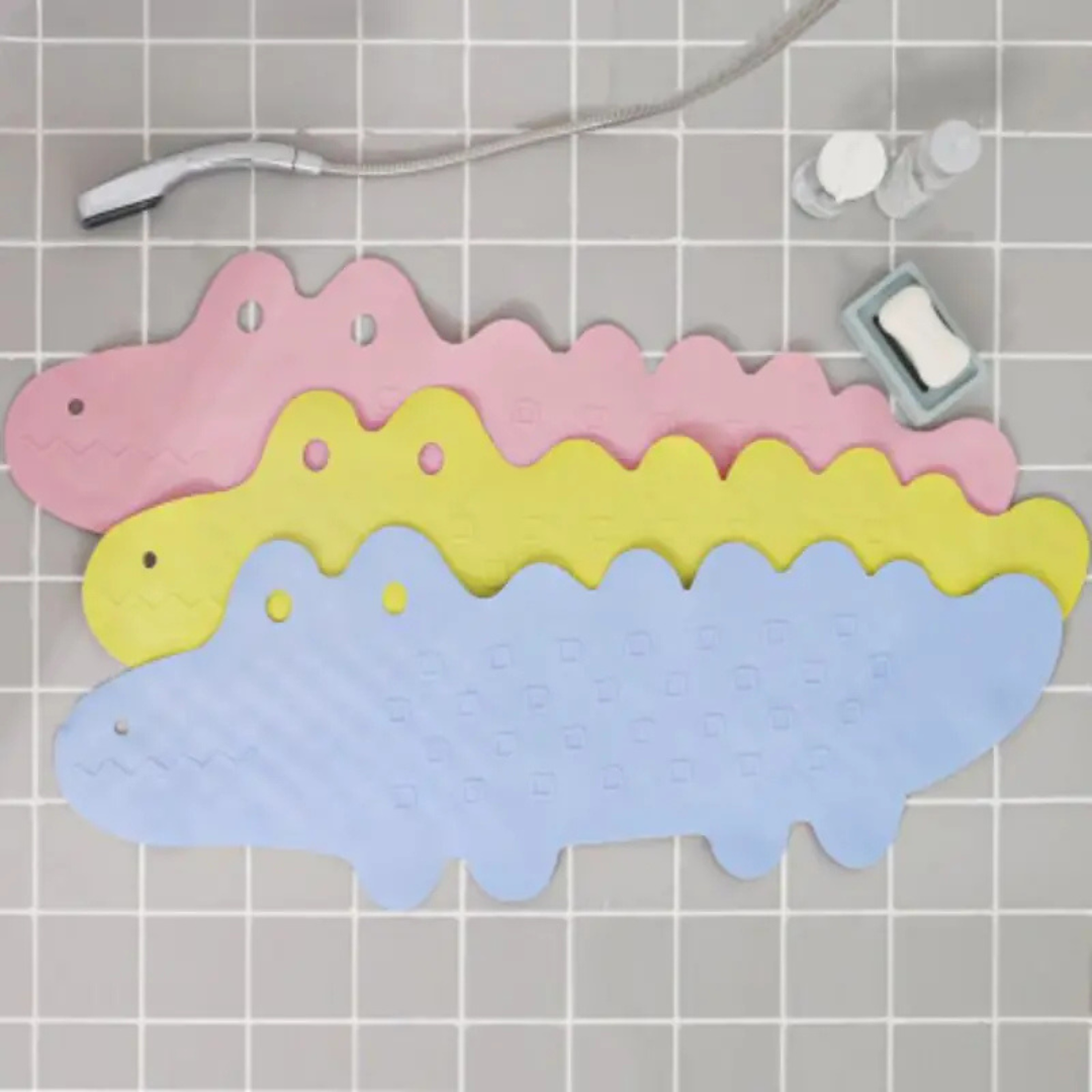 Full view of a kids' non-slip bath mat with a friendly crocodile, perfect for playful safety.