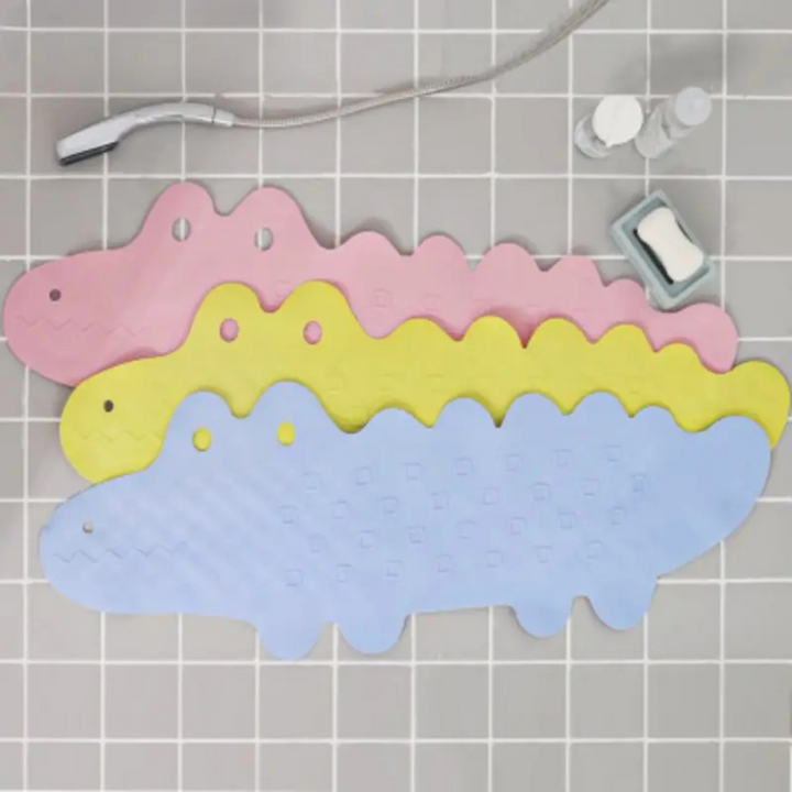 Full view of a kids' non-slip bath mat with a friendly crocodile, perfect for playful safety.