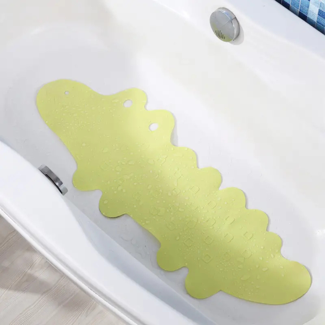 Crocodile shaped non-slip bath mat, a fun and safe bathroom accessory for kids.