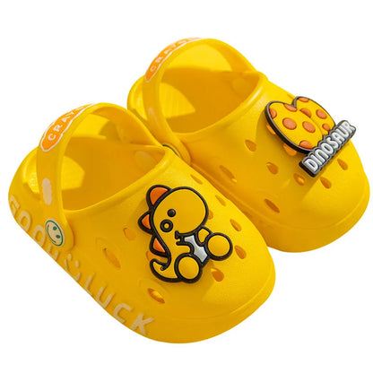 Close-up of a pink cartoon toddler sandal, non-slip sole and soft rubber construction