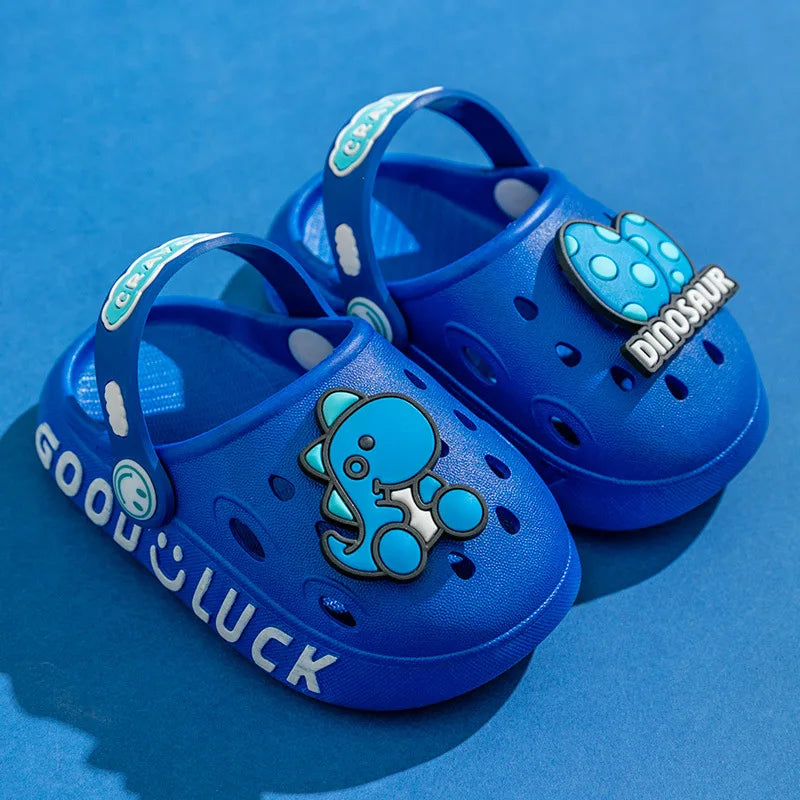 Pair of green non-slip cartoon sandals, comfortable and playful summer shoes for toddlers