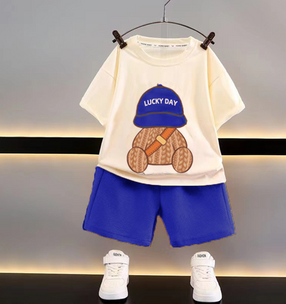Funky kids' summer clothing set for boys or girls, breathable cotton blend, ideal for playwear adventures.