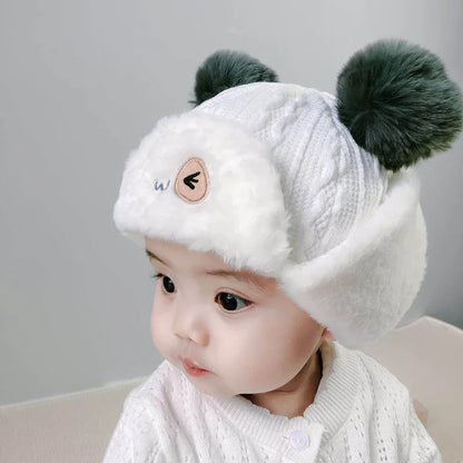 Close-up of a plush baby winter hat, soft texture infant cap for autumn winter, comfortable baby accessory